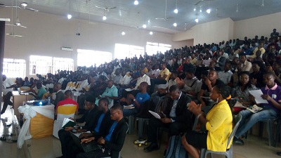 Cross-section of students and staff at the Symposium
